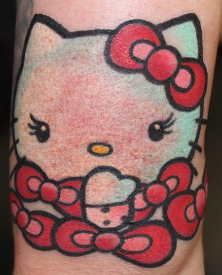 Looking for unique  Tattoos? Red Bow Hello Kitty Tattoo